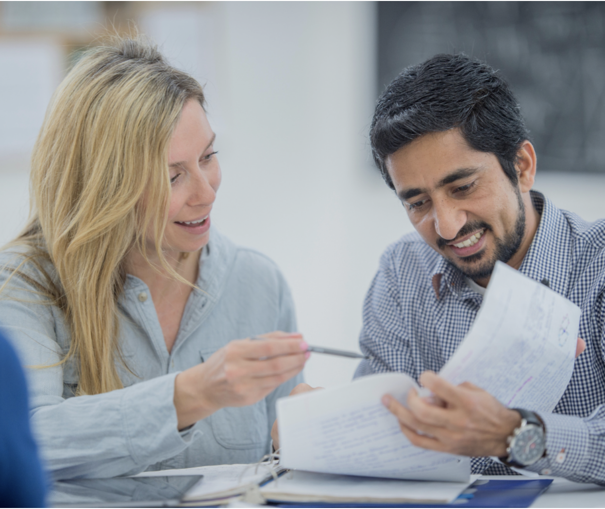 Two people looking at a test.